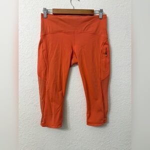Lululemon Cropped Pocket Athletic Leggings in Orange - 8